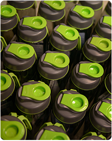 A photo of water bottles made with quality assurance at Precision Thermoplastics Components manufacturing facility in Lima, Ohio.